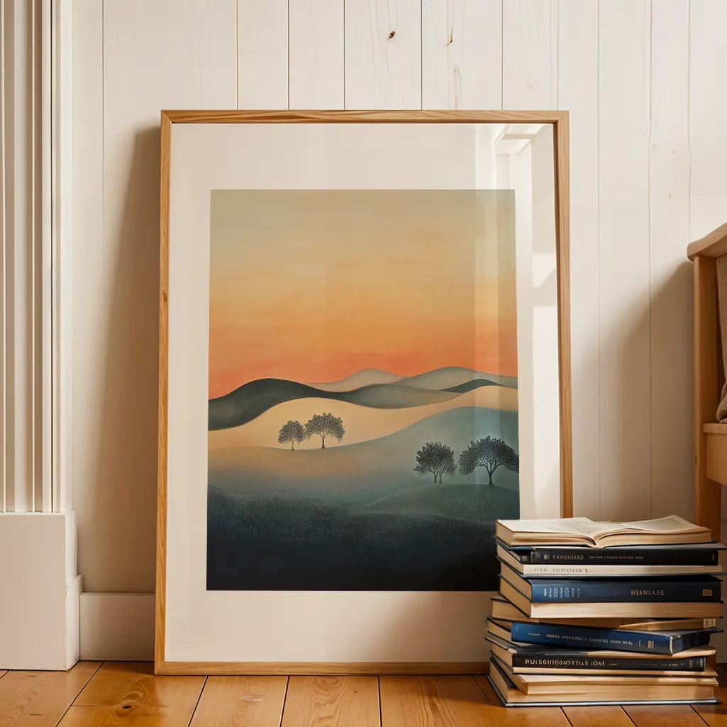 Framed botanical print on a wooden floor, next to a stack of books against a white wall.